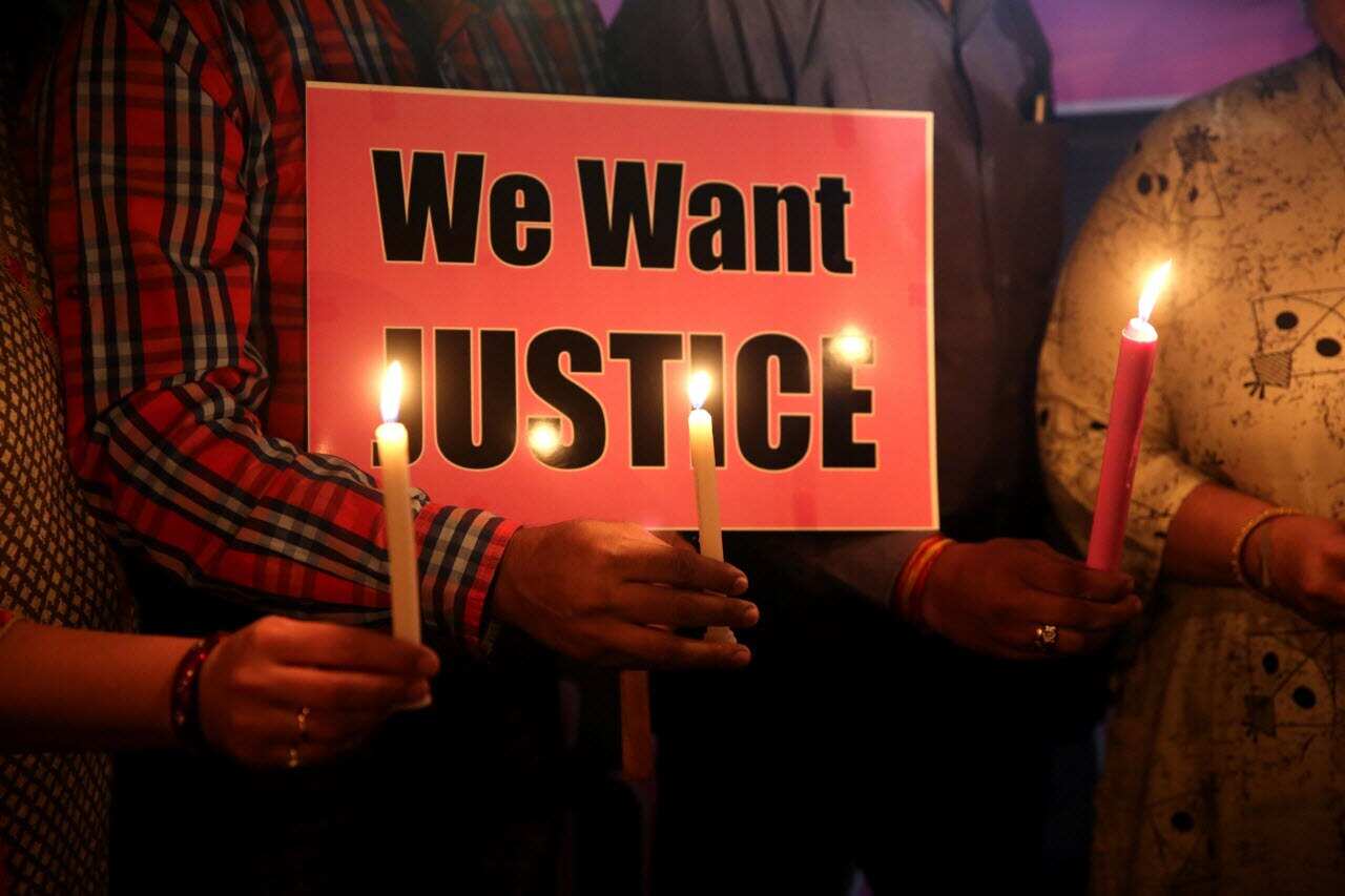 College girls and women take part in a candle light vigil to protest demanding justice against a gang-rape incident, in Bhopal, India, 07 November 2017. 