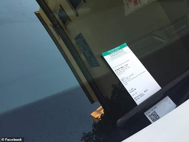 Police car spotted with '$200 parking fine' on Australia Day