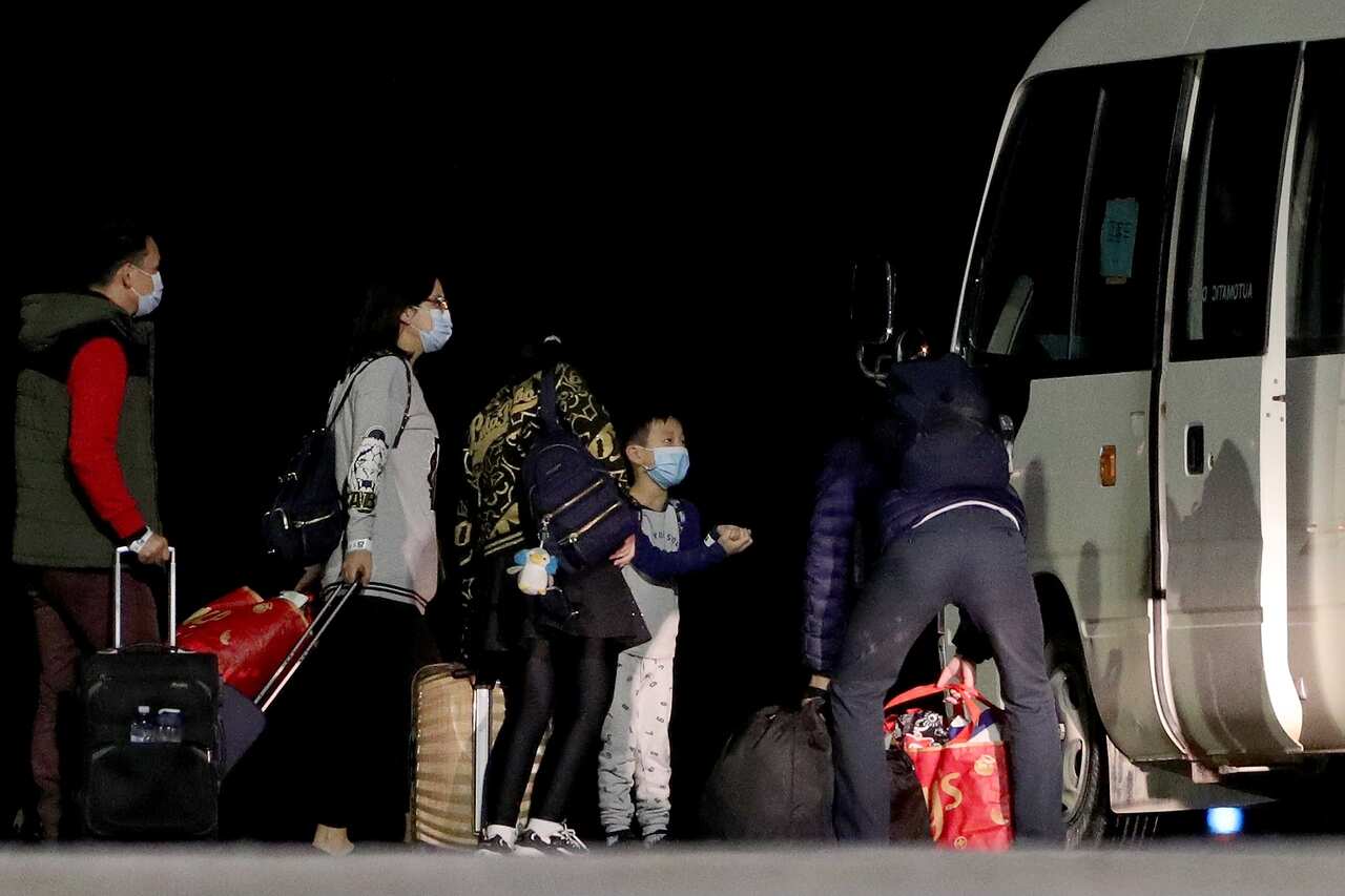 More Australians arrive on Christmas Island after being evacuated from the virus epicentre of Wuhan. 