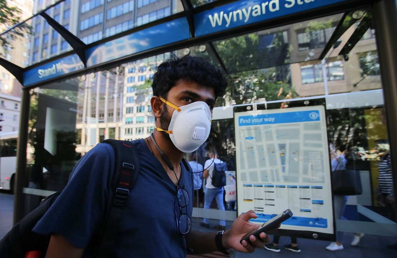 A man wears a face mask in Sydney.
