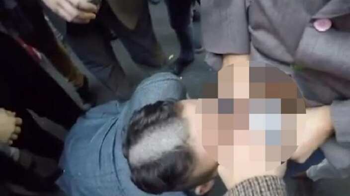 Evatt House students performing the bizarre penis drinking ritual.