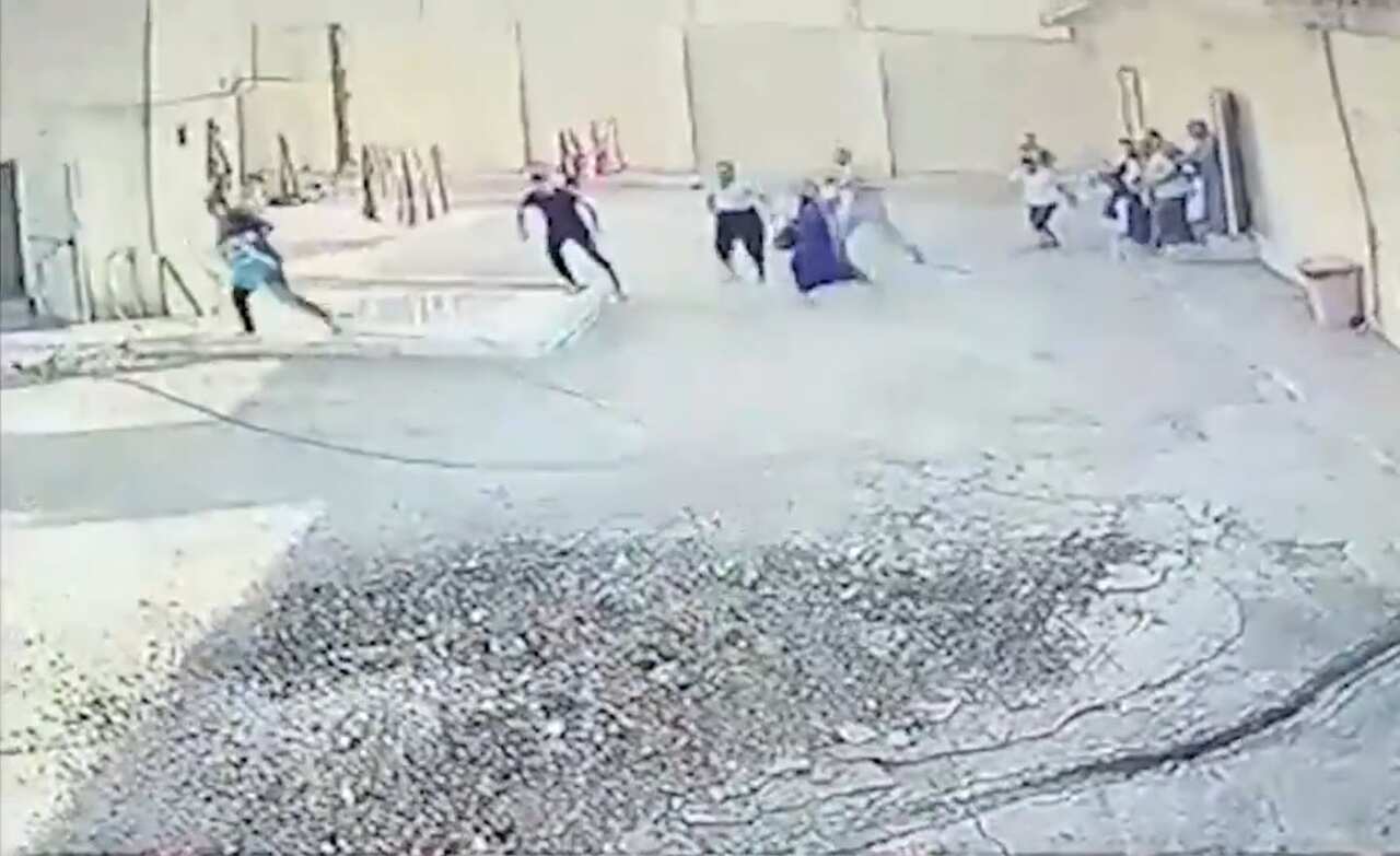 Video distributed by a Kurdish official reportedly shows a group of detainees absconding from prison in northeastern Syria.