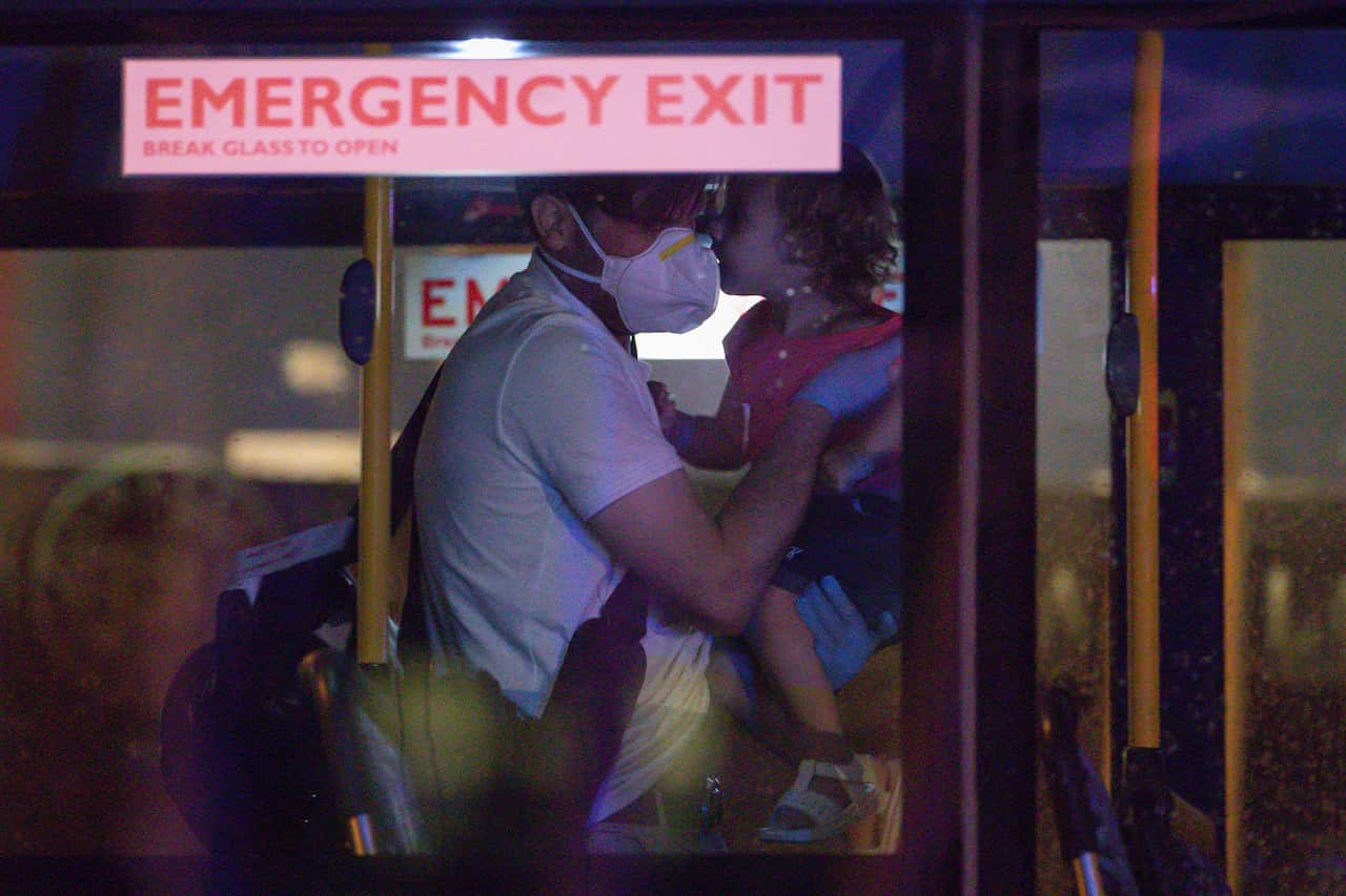 Evacuees from Afghanistan are seen arriving at the Hyatt hotel in Perth.