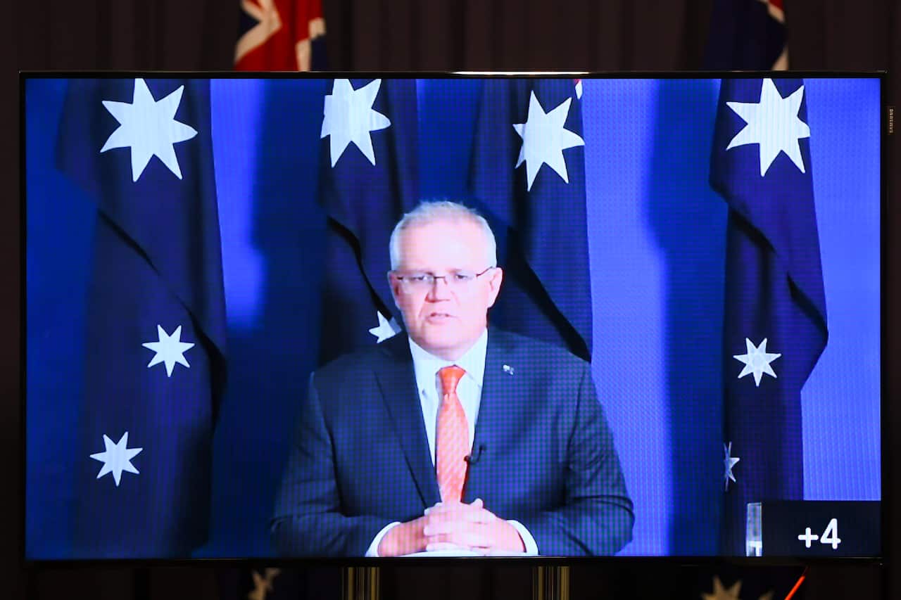 Australian Prime Minister Scott Morrison speaks to the media during a virtual press conference at Parliament House in Canberra. 