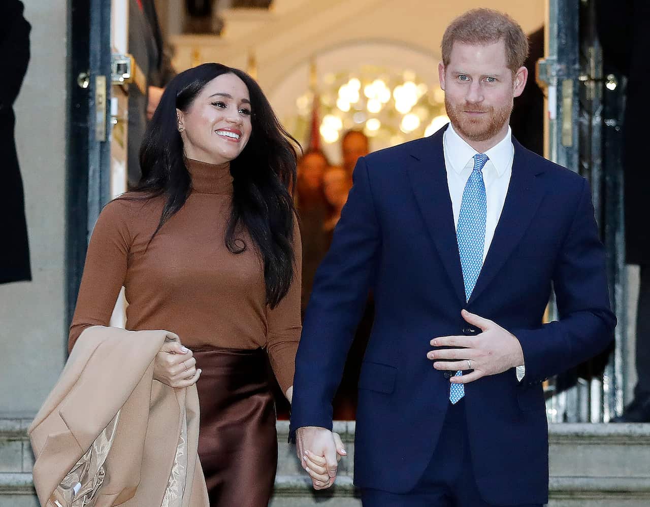 Harry and Meghan leave Canada House in London, earlier this month.