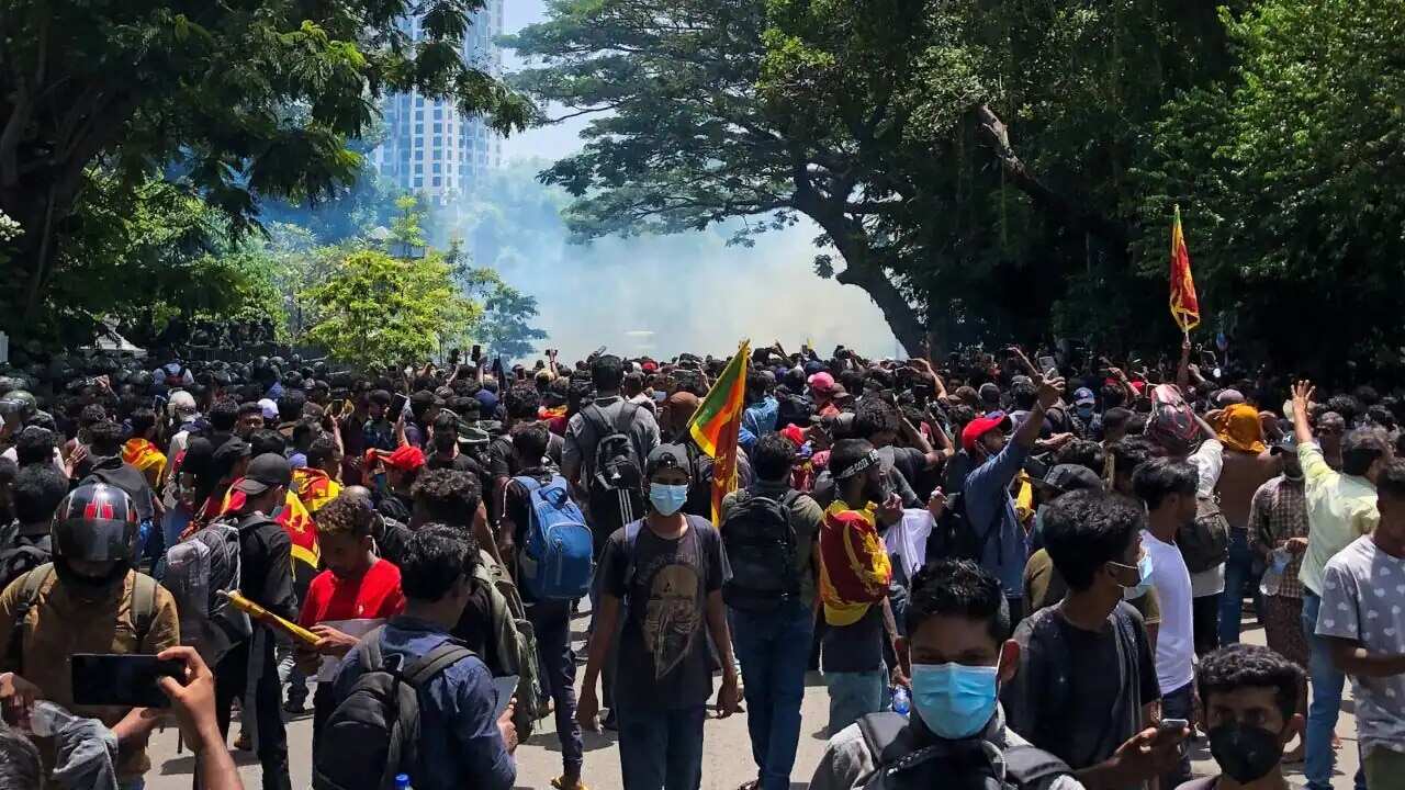 Anti-government protesters outside the office of Sri Lanka's prime minister in the country's capital, Colombo, on 13 July, 2022.