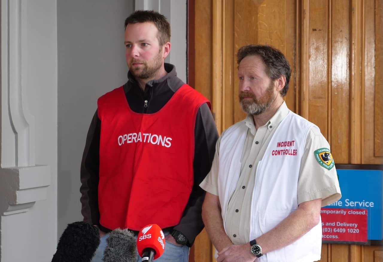 Wildlife biologist Kris Carlyon and Parks and Wildlife manager Nic Deka.