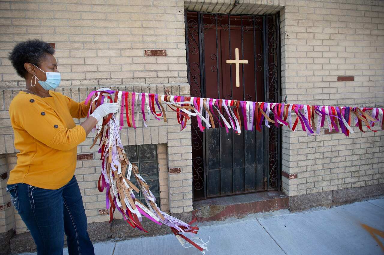 Vivian Marshall stretches out a line of ribbons at the Grant African Methodist Episcopalian Church in Boston, Massachusetts.