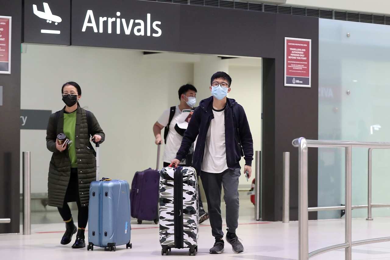 Passengers from a China Southern Airlines flight arrive in Australaia.