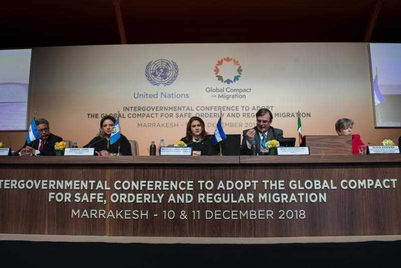 A United Nations conference adopted a migration policy, despite the withdrawal of several nations.