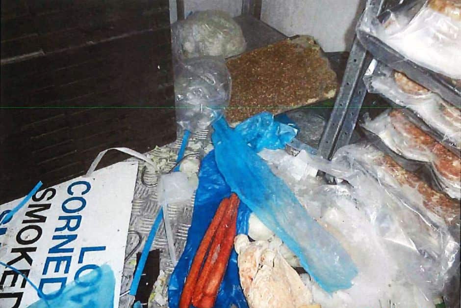 Exposed meat among rubbish on floor of take away store coolroom