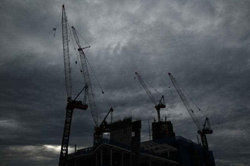 Challenges in boosting productivity - which involves increasing the value derived from the work and resources put into the economy - are also a risk.