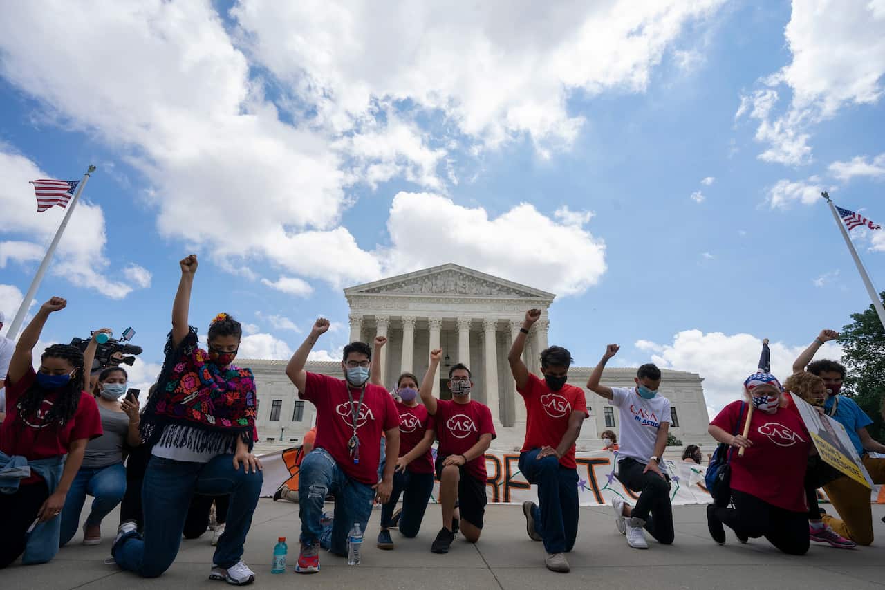 A group of people rally outside the United States Supreme Court in Washington D.C., U.S., on Thursday, June 18, 2020. 