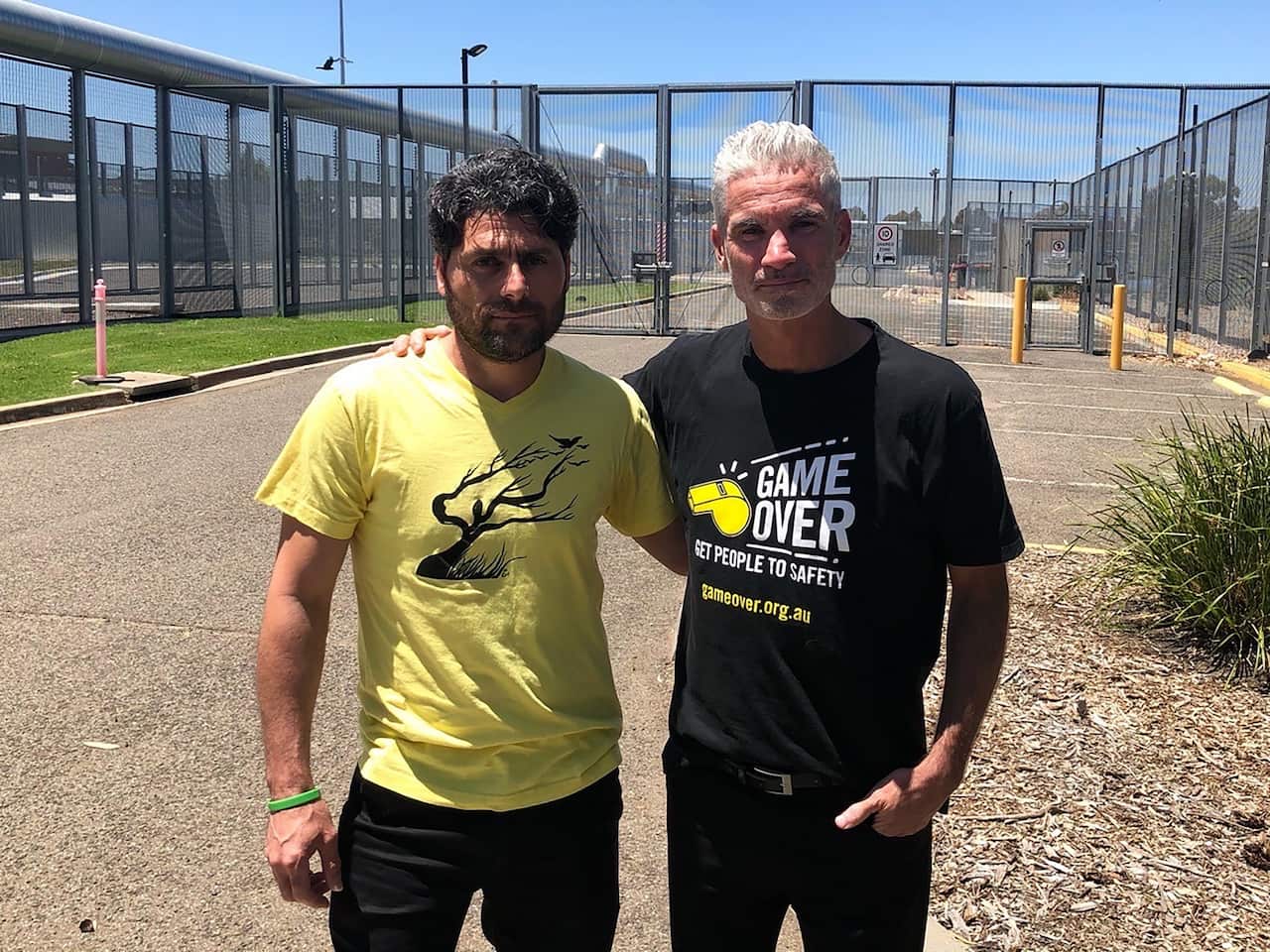 Refugee advocate Craig Foster with former immigration detainee Farhad Bandesh. 