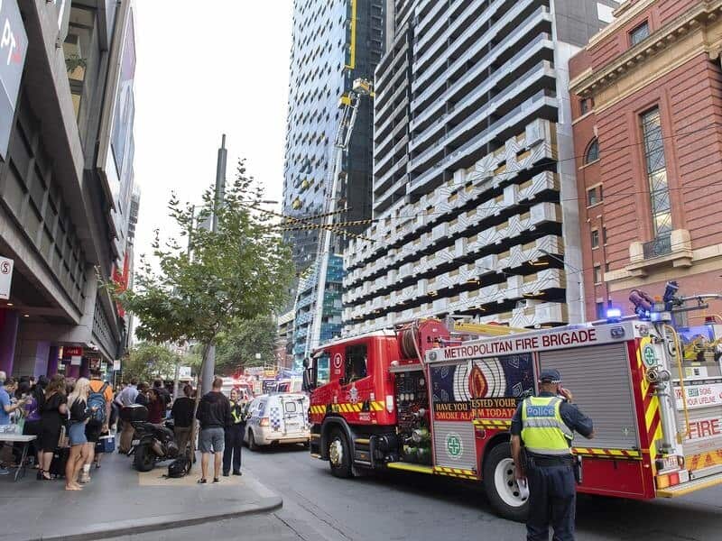 A firetruck is seen at the scene of an apartment fire.