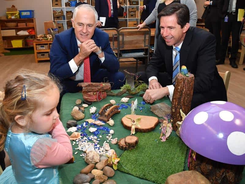 Malcolm Turnbull and Simon Birmingham at a childcare centre.