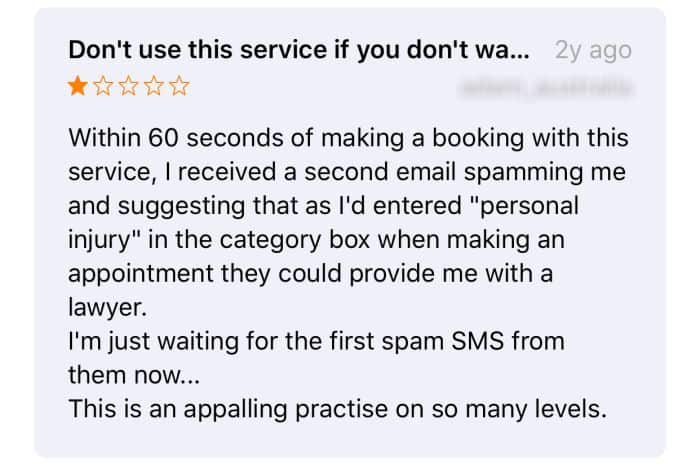 A negative review on HealthEngine's app page complaining about contact from personal injury lawyers.