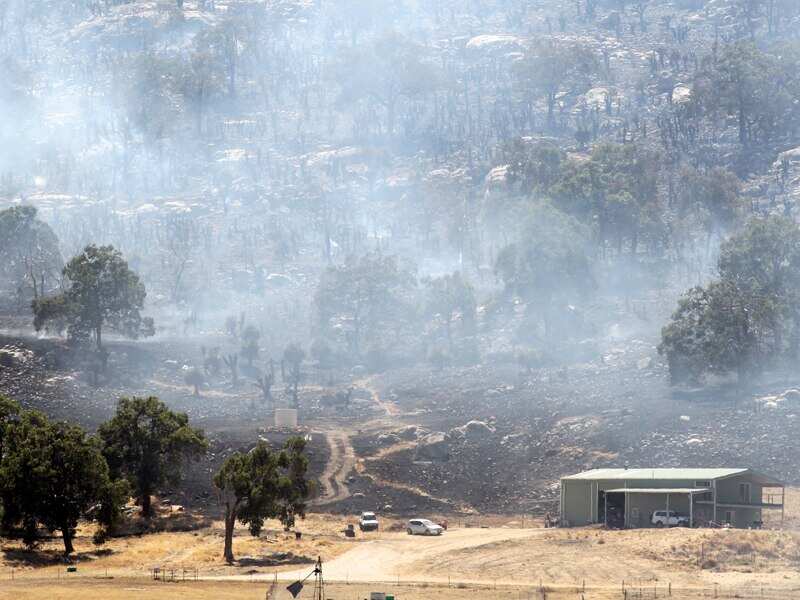 Bushfire hot spots continue to burn