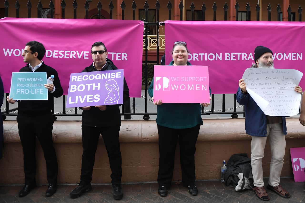 A small group of anti abortion protesters rally outside NSW State Parliament during the Reproductive Health Care Reform Bill 2019 debate.