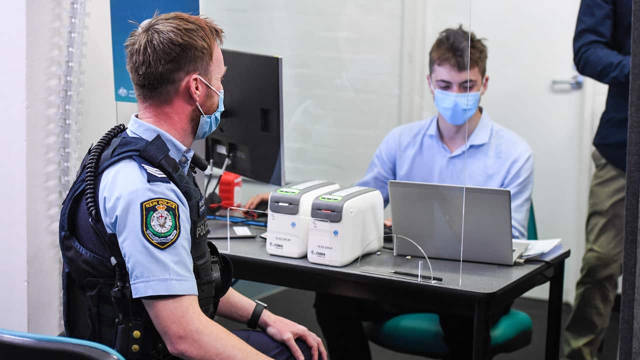 Essential workers including police and medial professionals register at the Royal Prince Alfred Hospital Vaccination Hub in Sydney, Monday, 22 February, 2021.