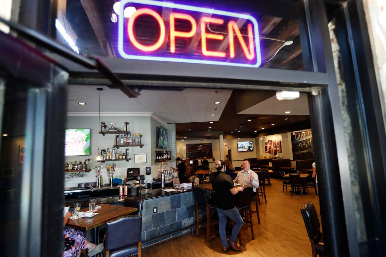 A Texas restaurant opened full service to customers on Friday after restrictions in place were eased by the state.