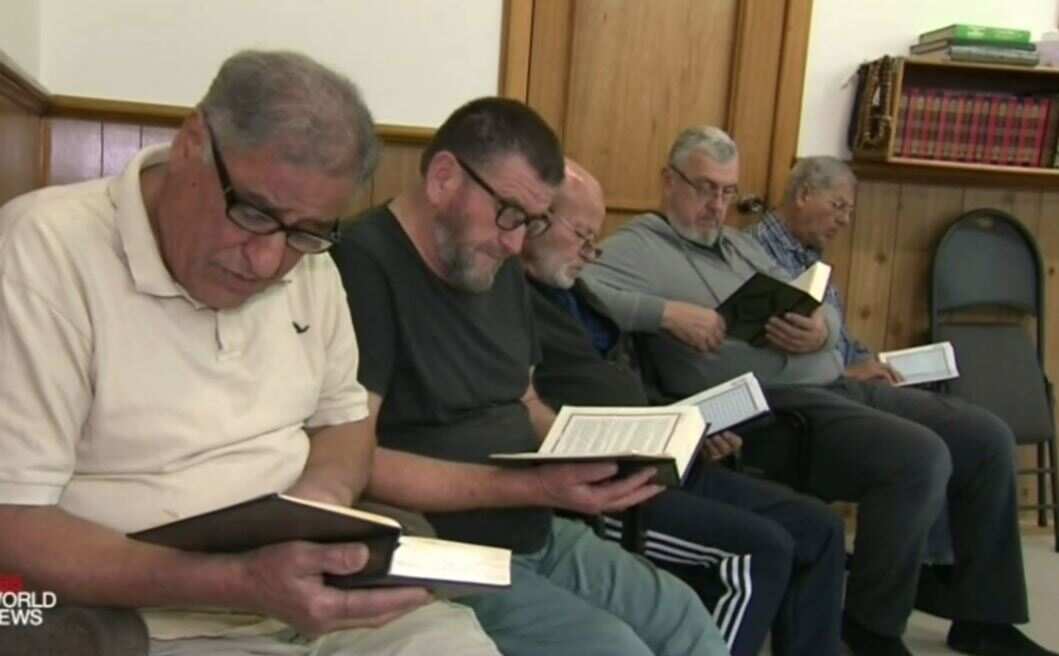 Sydney Muslims read the Koran ahead of Ramadan. 