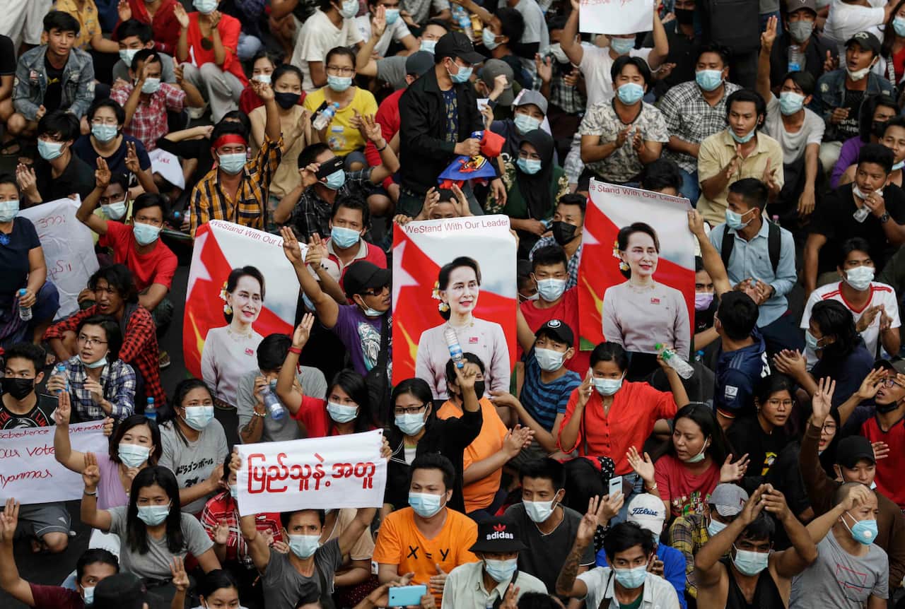 Demonstrators flash the three-finger salute during a protest against the military coup, in Yangon, Myanmar, 6 February 2021. 