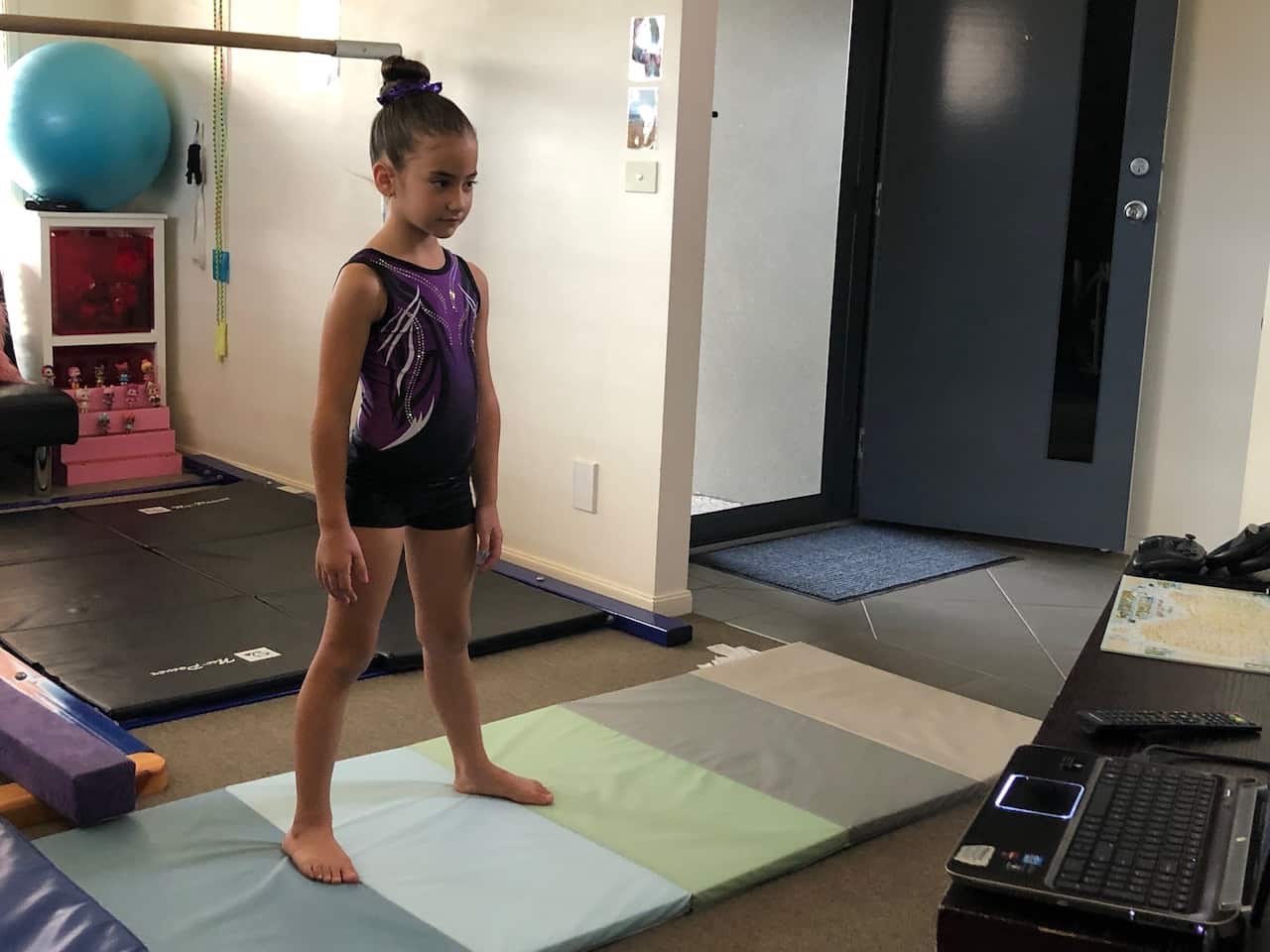 Makayla Gorgioski doing gymnastics at home