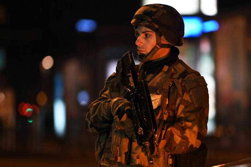 French soldiers wounded the suspected gunman as he fled from the scene of the shooting.