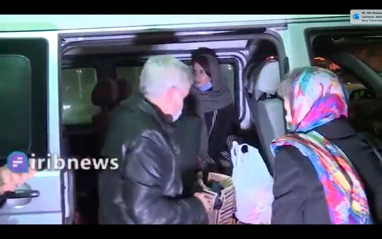 Kylie Moore-Gilbert, center inside van, is seen in Tehran, Iran.