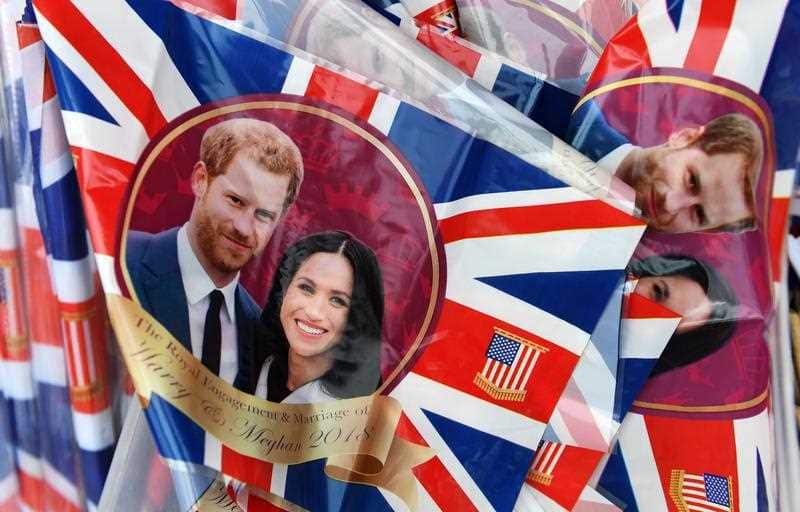 Royal wedding plastic flags with Prince Harry and Meghan Markle on sale at a store in Windsor, Britain, 16 May 2018.