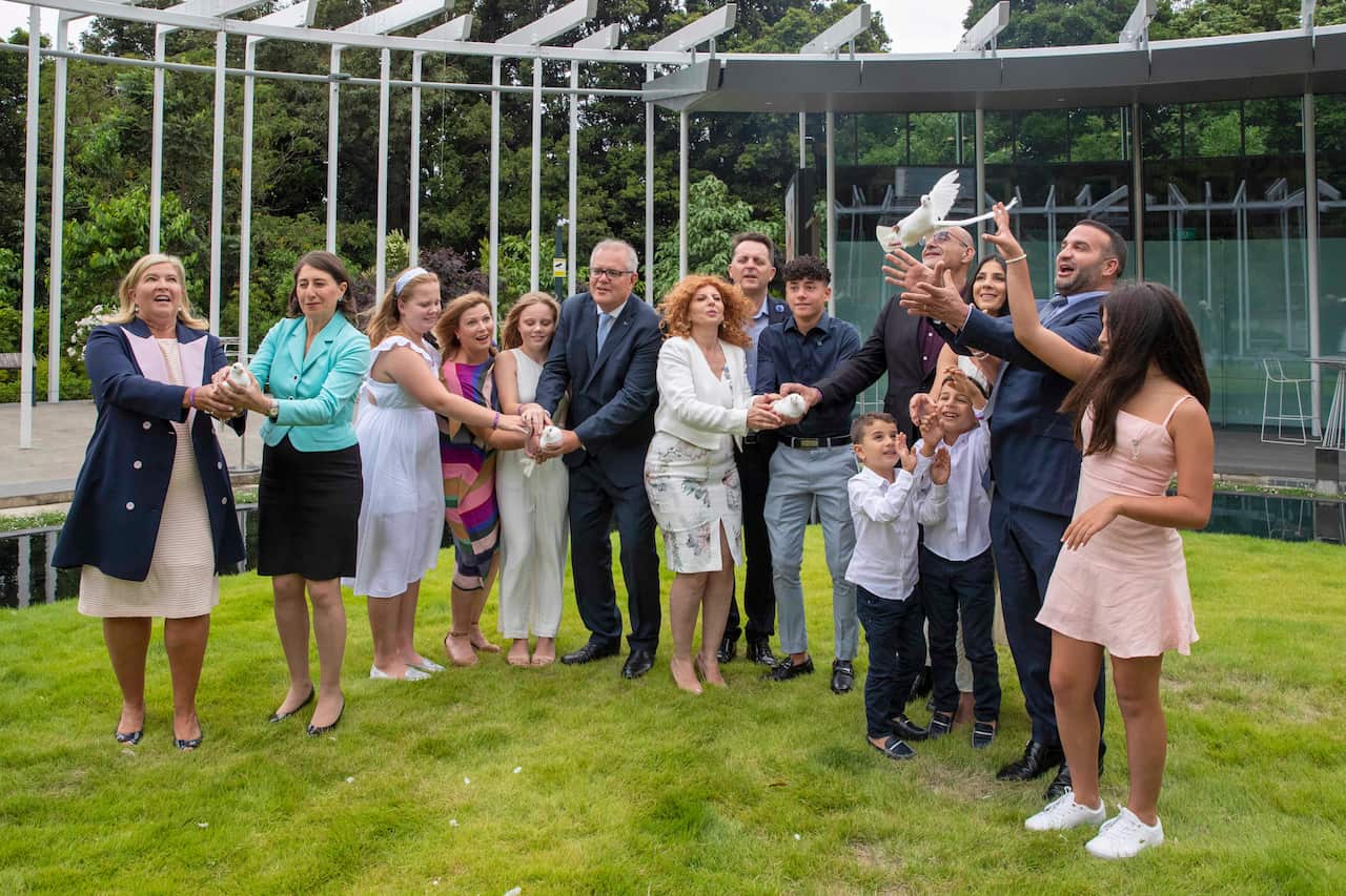 Prime minister Scott Morrison, NSW Premier Gladys Berejiklian and family release doves in honour of children killed a year ago during the launch of i4give Day
