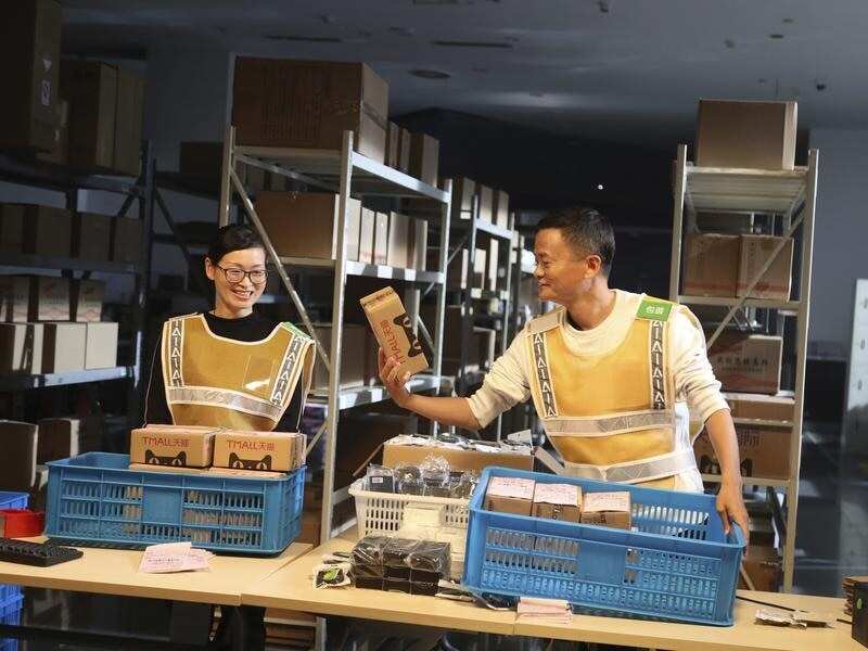 Jack Ma or Ma Yun, right, chairman of Alibaba Group