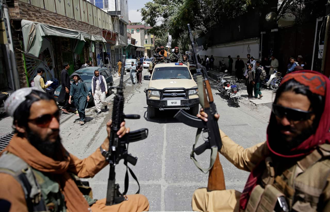 Taliban fighters patrol Kabul, Afghanistan, Thursday, Aug. 19, 2021. 