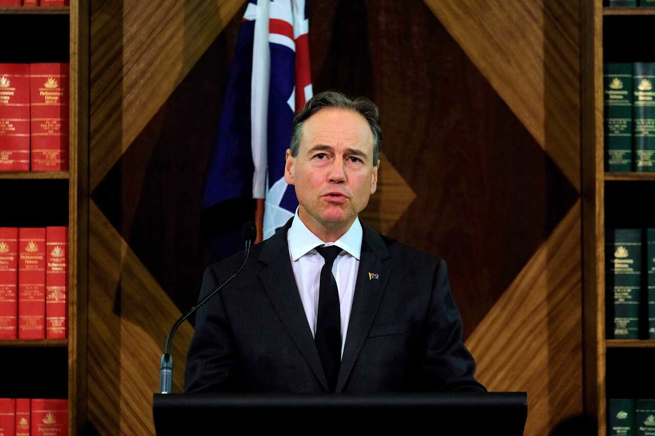 Health Minister Greg Hunt speaks to the media.
