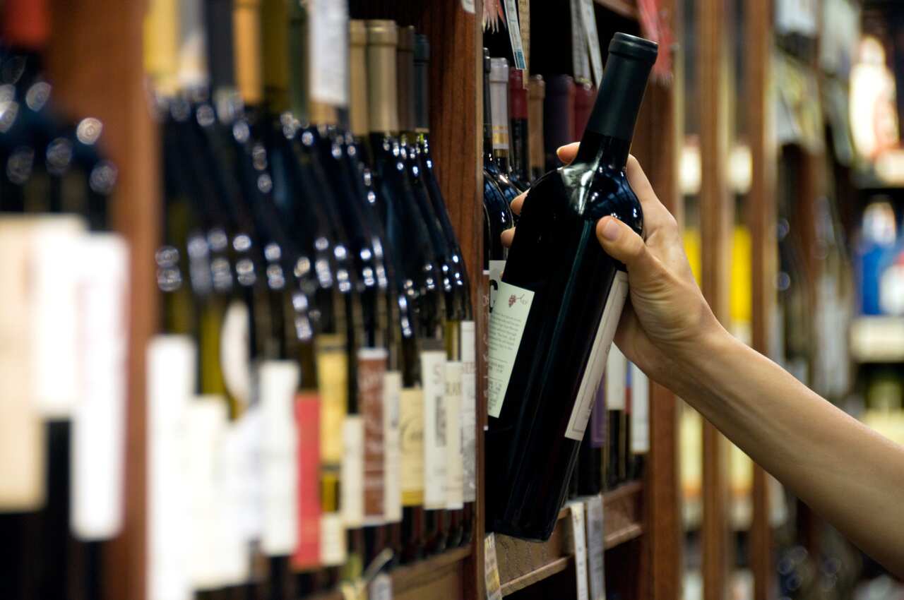 Liquor retailers across Australia are imposing tougher restrictions on alcohol purchases in an effort to stop customers stockpiling.