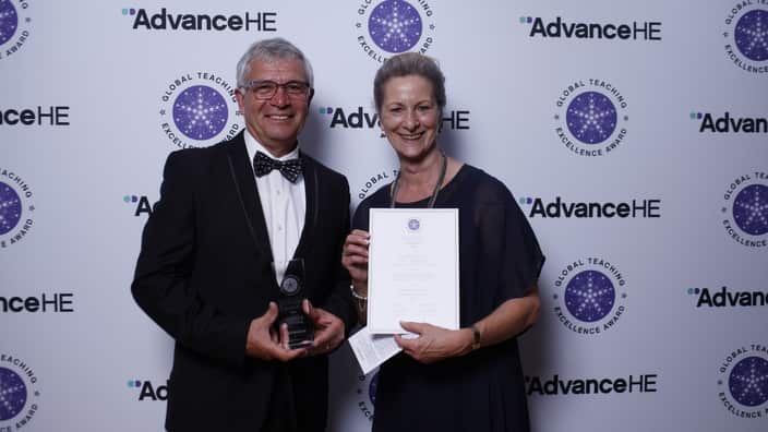 Professor Joe Chicharo, received the global accolade on behalf of the University