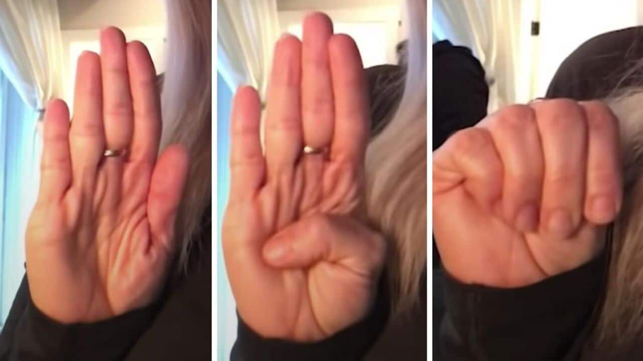 Canadian Women's Foundation demonstrates how to use the "Signal for Help"