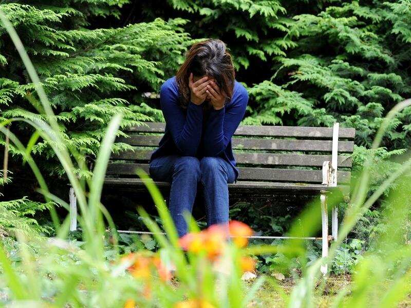 A woman showing signs of depression