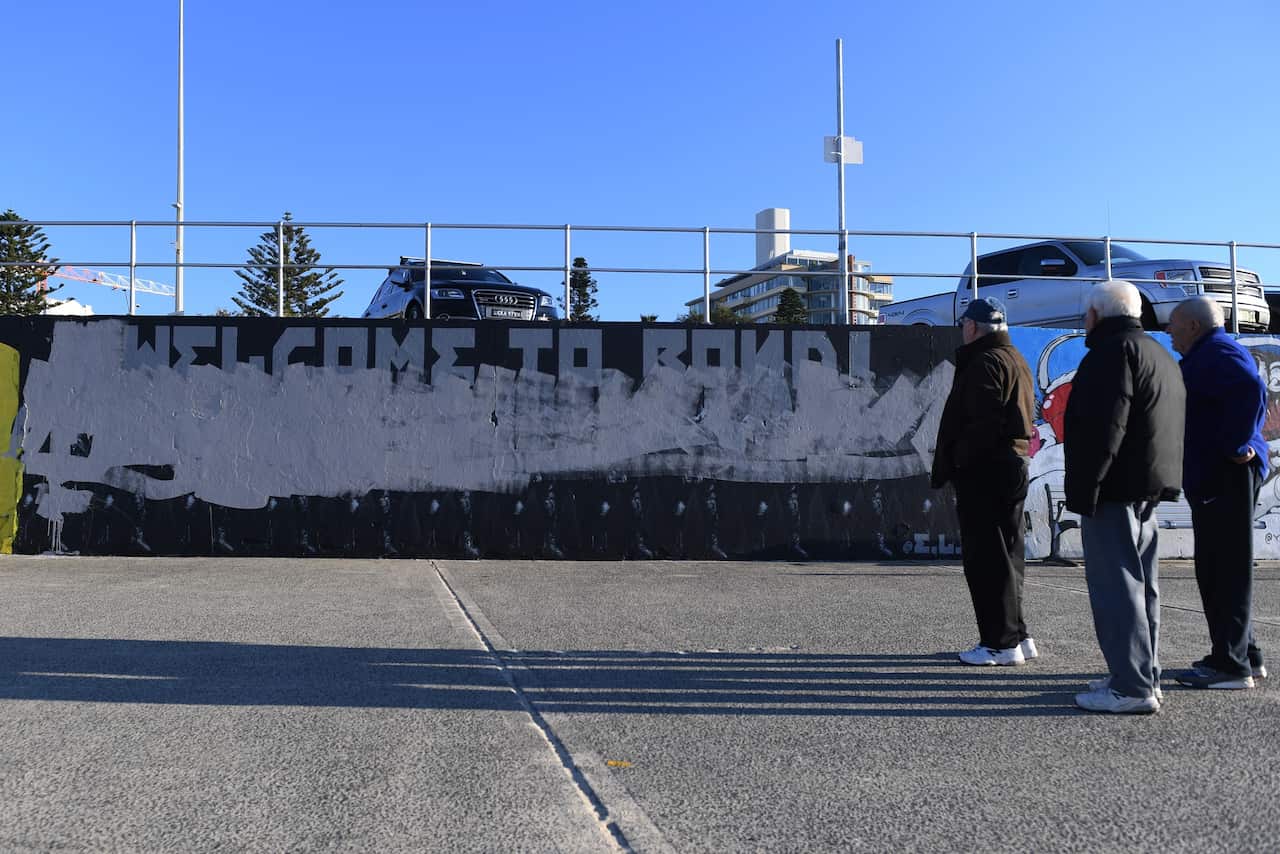 A controversial mural by artist Luke Cornish has been defaced at the iconic Bondi Beach in Sydney, Wednesday, August, 7, 2019. 