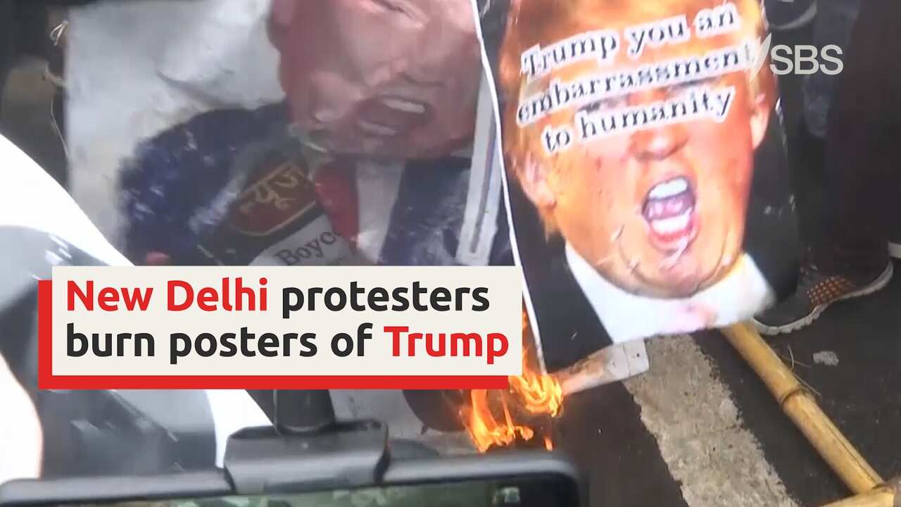 New Delhi protestors burn images of Trump