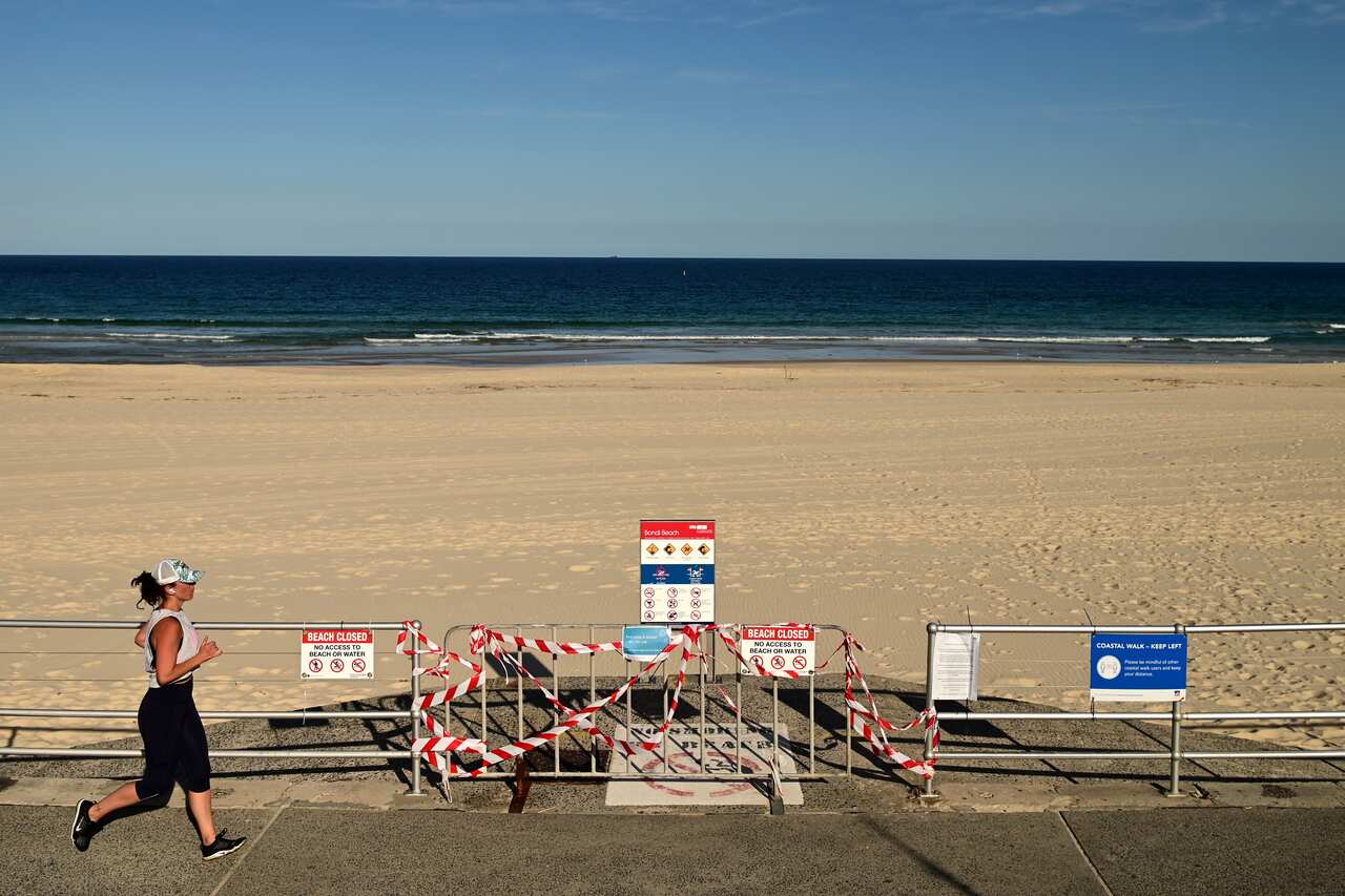 Sydney's iconic Bondi Beach will partially open to swimmers and surfers next week as more beaches in NSW begin easing COVID-19 restrictions.