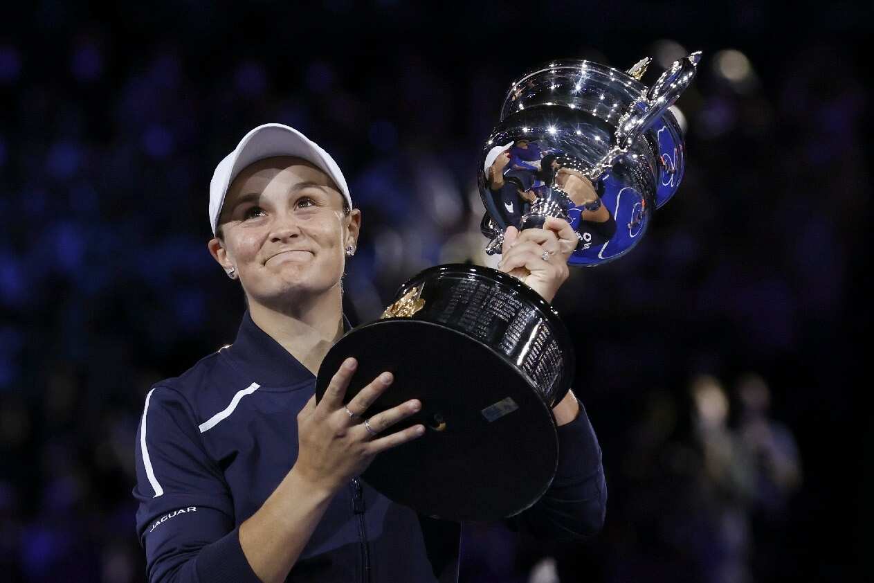 Ash Barty holds the Daphne Akhurst Memorial Cup after winning the women's singles final at the Australian Open. 