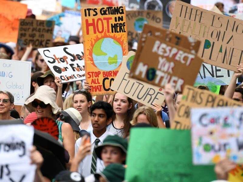 School students take part in a climate change strike in Brisbane.