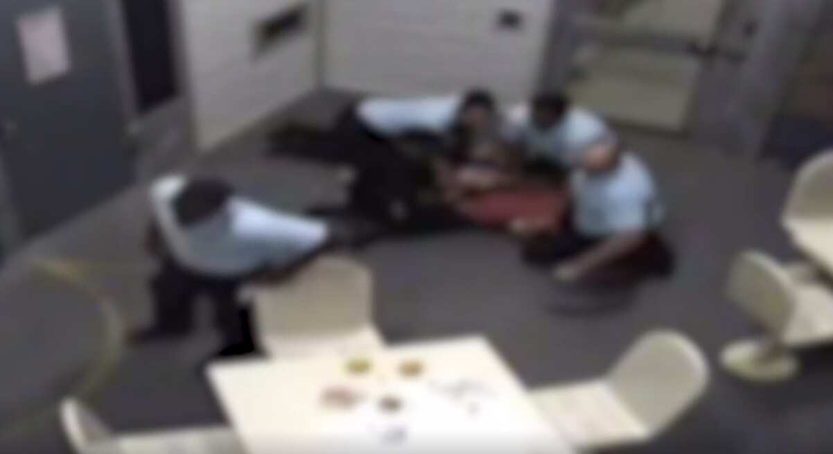 Mr FE had a tooth knocked loose as his head was forced on to the concrete floor. 