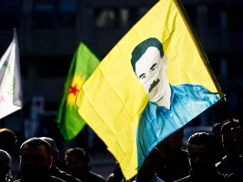 Kurdish protestors with the portrait of jailed leader Abdullah Ocalan