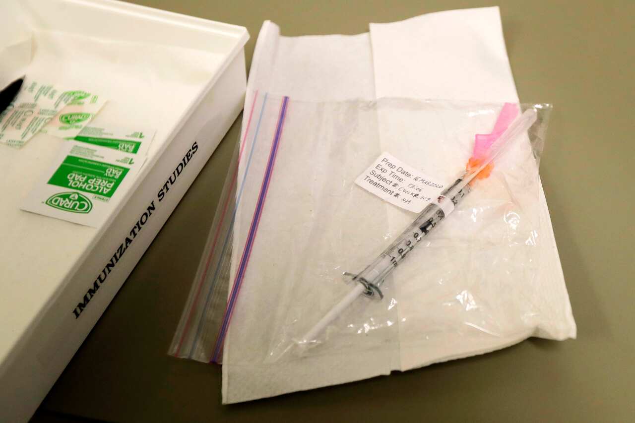 A syringe containing the first shot given in the first-stage safety study clinical trial of a potential vaccine for the COVID-19.