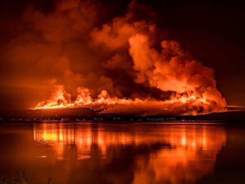 A fire is seen burning in Little Grove.