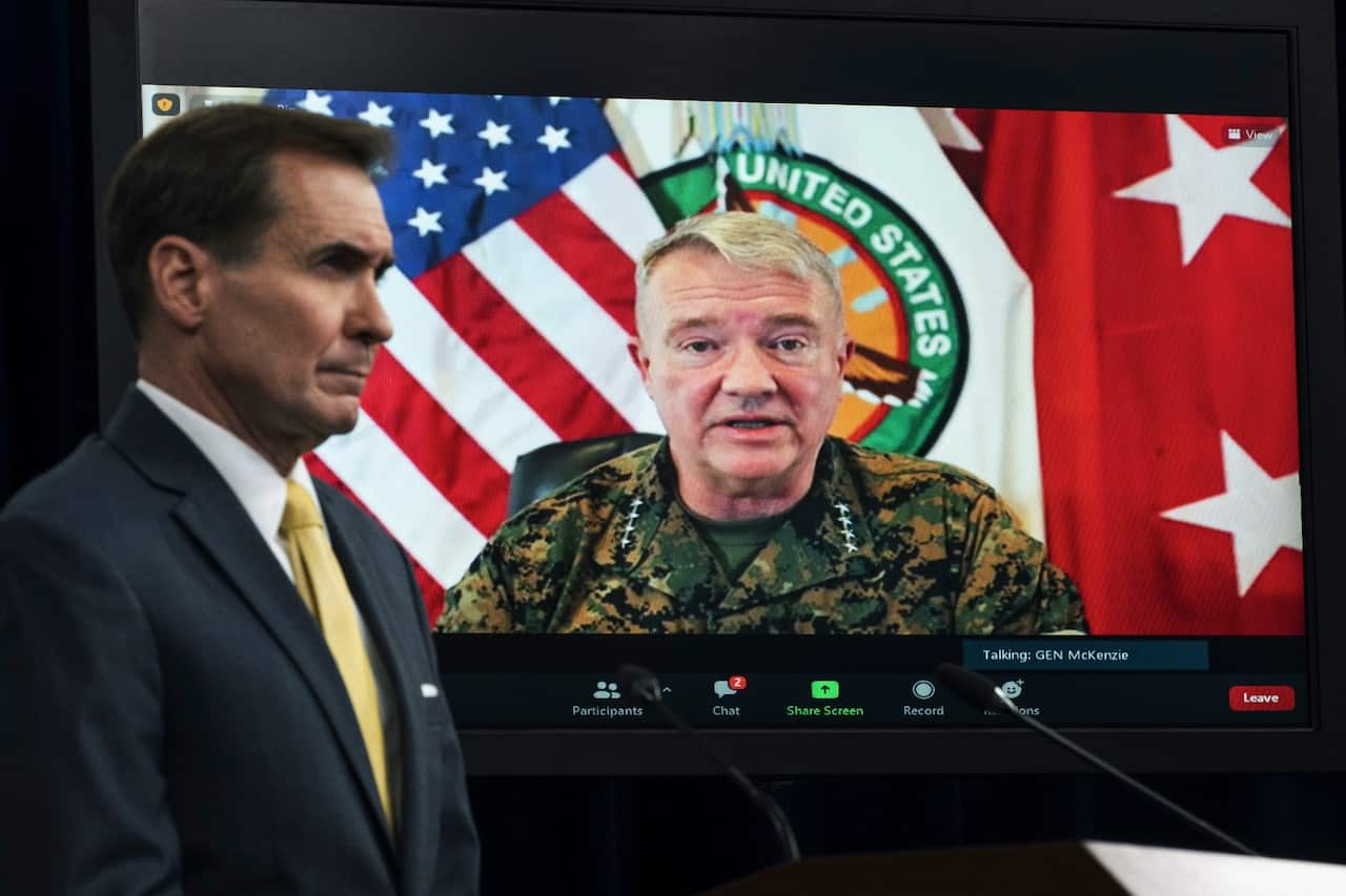 General Frank McKenzie, Commander of US Central Command, appears on screen during a briefing on Afghanistan, moderated by Pentagon spokesman John Kirby.
