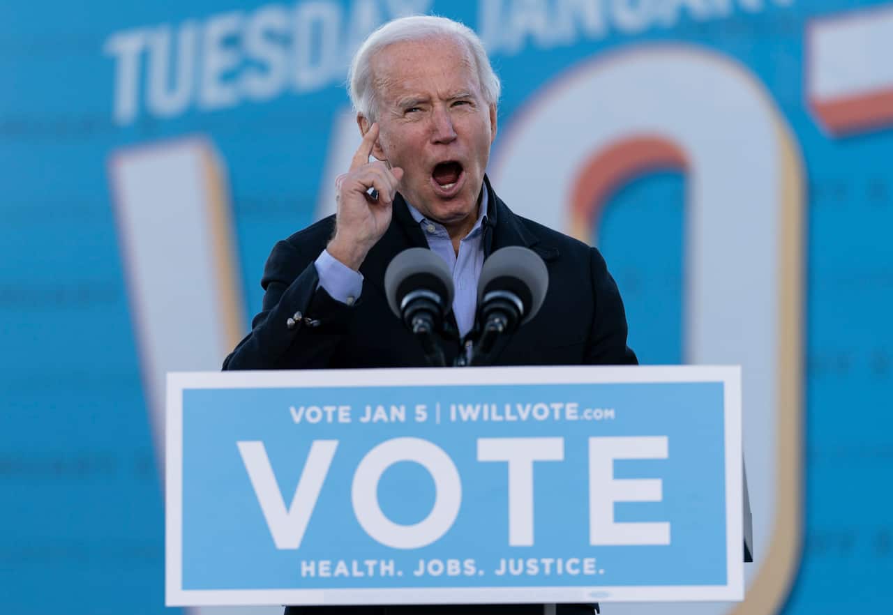 President-elect Joe Biden speaks in Atlanta, Monday, Jan. 4, 2021, to campaign for Georgia Democratic candidates for U.S. Senate, Rev. Raphael Warnock and Jon Ossoff. (AP Photo/Carolyn Kaster)